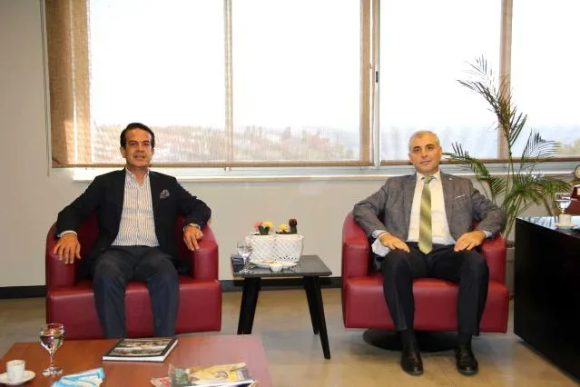 (SGK) İl Müdürü Nejat Deniz, Antalya Ticaret Borsası Yönetim Kurulu Başkanı Ali Çandır ile bir araya geldi